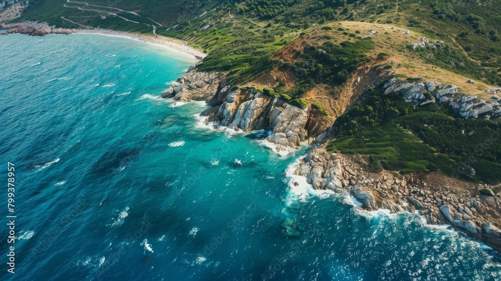 Epic Aerial Shot of Untamed Coast, Waves Crashing Against Cliffs