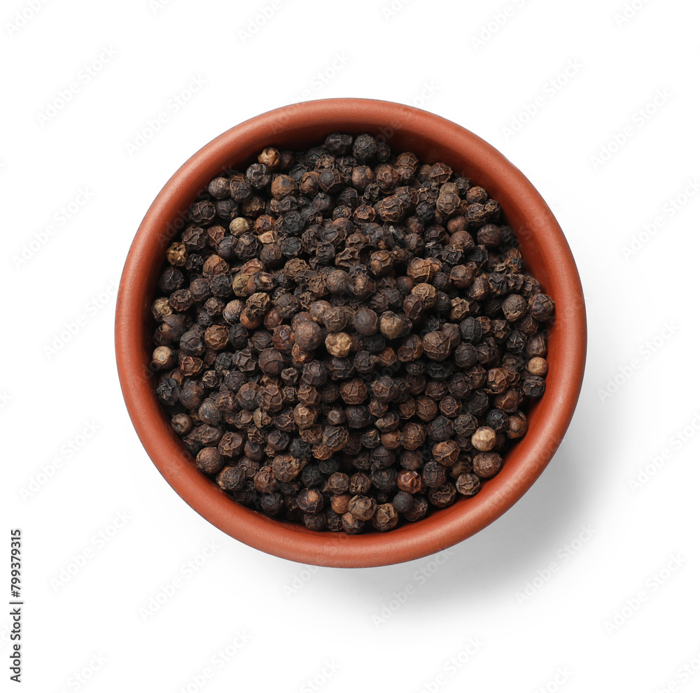 Aromatic spice. Many black peppercorns in bowl isolated on white, top view Aromatic spice. Many black peppercorns in bowl isolated on white, top view