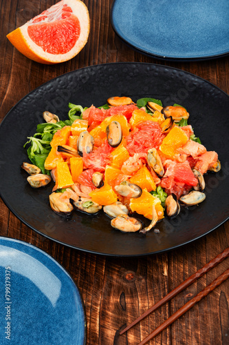Salad with citrus fruits and seafood.