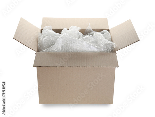 Transparent bubble wrap in cardboard box isolated on white