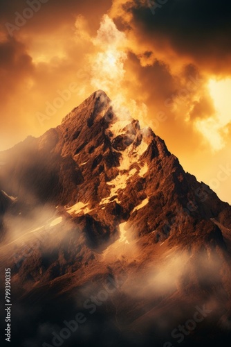 The summit of the mountain is shrouded in clouds and mist © Adobe Contributor