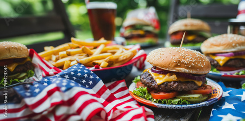 A vibrant 4th of July celebration with classic American burgers and fries served on a festive table decorated with the US flag.
