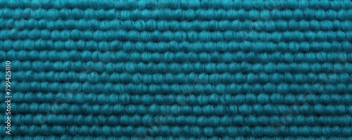 Cyan close-up of monochrome carpet texture background from above. Texture tight weave carpet blank empty pattern with copy space for product 