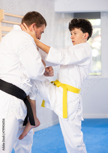 Private karate lesson for teenager in the gym