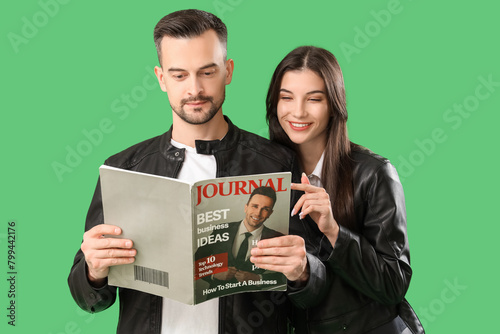Cool young couple reading m...