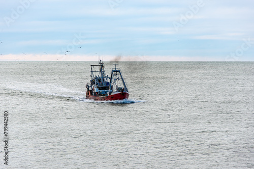 A fishing vessel sailing in the Atlantic Ocean near Mar del Plata, Argentina