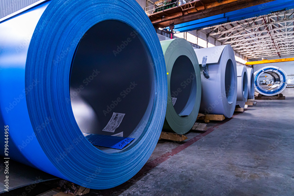 Cyanic Symphony: Multiple Blue Steel Rolls Await Processing in a Russian Factory Cyanic Symphony: Multiple Blue Steel Rolls Await Processing in a Russian Factory