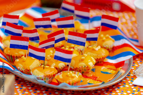Photography Colourful of King’s Day (in Dutch: Koningsdag) Free market on street with food a