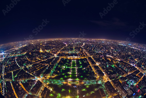 aerial view of illuminated night city panorama of Paris with street lights, drone top view from above, Champs Elysees and Elysee Palace, France photo