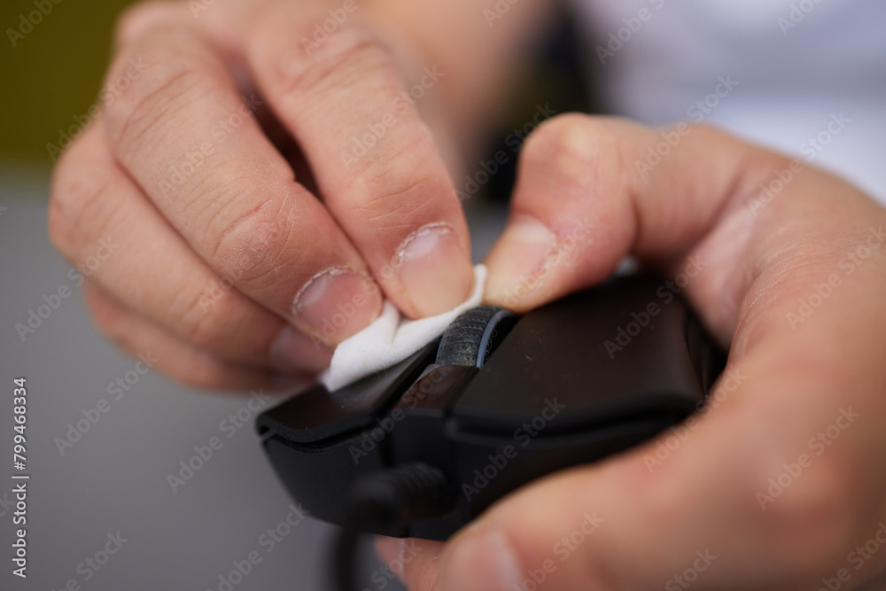wipes cleaning disinfection of work mouse. Wiping with antibacterial wipe the surface of desk, keyboard wipes cleaning disinfection of work mouse. Wiping with antibacterial wipe the surface of desk, keyboard