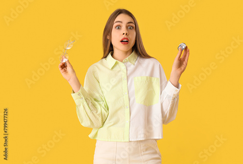 Shocked young woman with ey...