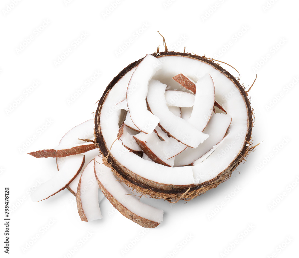 Obraz premium Coconut pieces in nut shell isolated on white