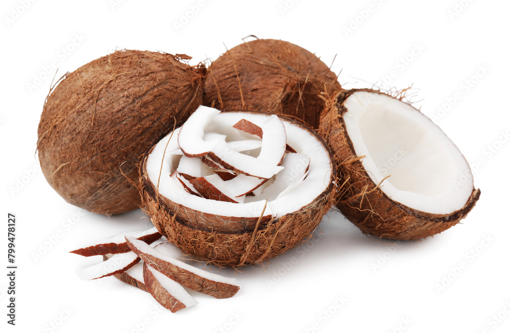 Obraz premium Coconut pieces and nuts isolated on white
