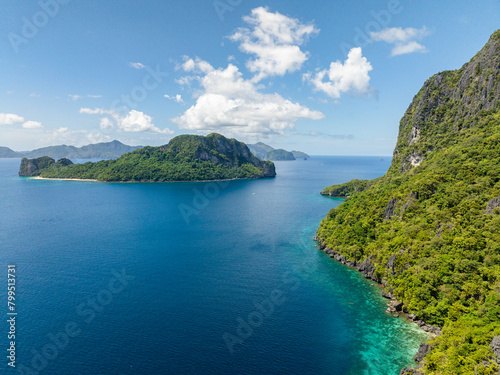 Blue sea in Cadlao and Helicopter Island. Blue sky and clouds. El Nido, Palawan. Philippines. © MARYGRACE
