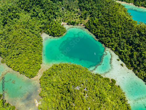 Top view of turquoise lagoon with beach in tropical island. Mindanao, Philippines. Summer and travel concept.