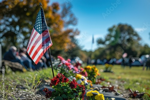 As the flag flutters in the breeze, memories of fallen heroes flood the minds of those gathered at the memorial.