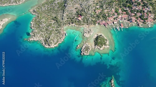 antalya kekova kalekoy castle aerial drone video turquoise blue sea cloudy sky settlement port and peninsula photo