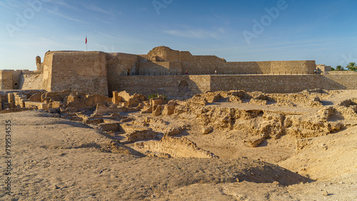 Panoramic view of the ruins of the ancient fortress of Qalat Al Bahrain, included in the UNESCO World Heritage List, at daytime, Manama, Bahrain 