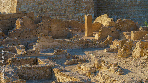 Panoramic view of the ruins of the ancient fortress of Qalat Al Bahrain, included in the UNESCO World Heritage List, at daytime, Manama, Bahrain 