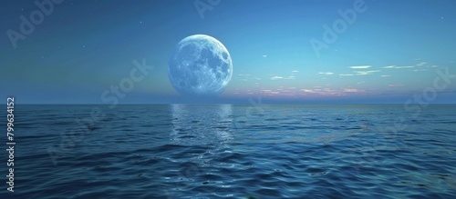 A stunning sight of a large moon ascending into the night sky over a tranquil ocean