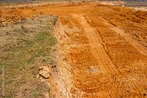 Removed soil for sand mining, removing overburden in a sand quarry photo
