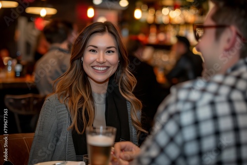 Young Woman Socializing at Business Casual Event. Young professional woman with a radiant smile engages in conversation at a business casual networking event in a modern bar setting.