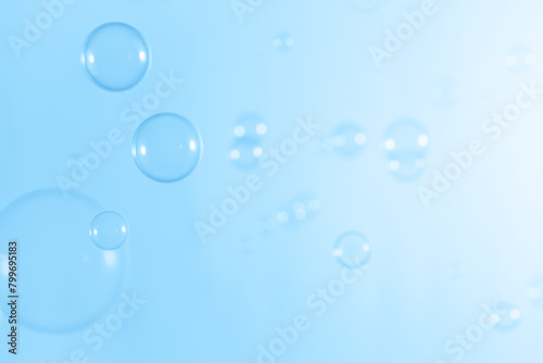 Beautiful Transparent Soap Bubbles Floating in The Air. Celebration Festive Backdrop. Freshness Soap Suds Bubbles Water. Abstract Blue Textured Background. 