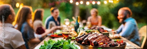 Backyard dinner table have a tasty grilled BBQ meat photo