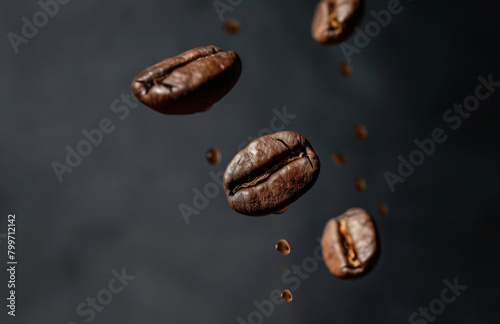 Coffee bean flying in the air in dark background