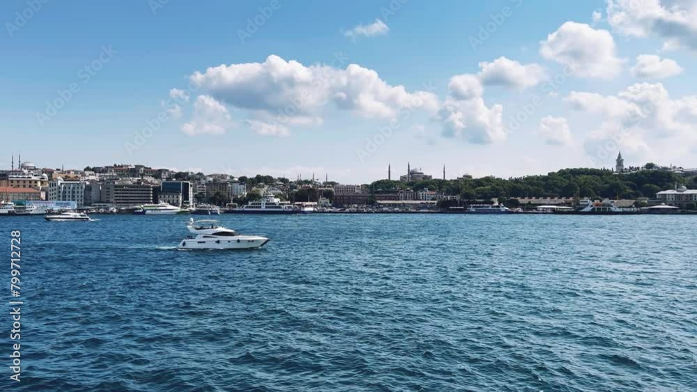 Turkey, August 5, 2022: View of Istanbul and its sights from a ferry sailing through the waters of the Bosphorus. A passenger ship. Bosphorus Tour. 4K Turkey, August 5, 2022: View of Istanbul and its sights from a ferry sailing through the waters of the Bosphorus. A passenger ship. Bosphorus Tour. 4K