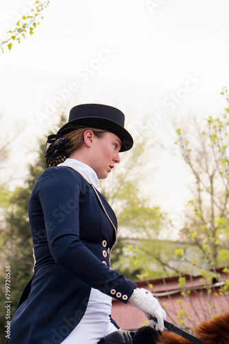 Close-up of dressage rider in traditional attire