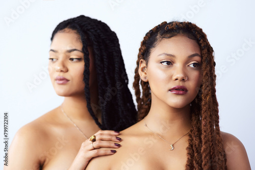 Beauty, skincare and black women in studio for wellness, cosmetics and dermatology. Friends, salon aesthetic and face of African people with natural glow, healthy skin or spa on white background