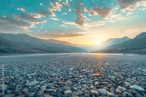 Asphalt road and mountain with sky clouds background at sunset - generative ai