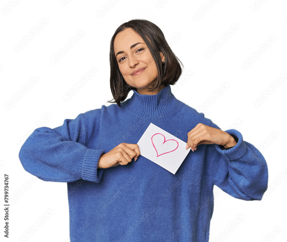 Young Caucasian woman with heart sign in studio Young Caucasian woman with heart sign in studio