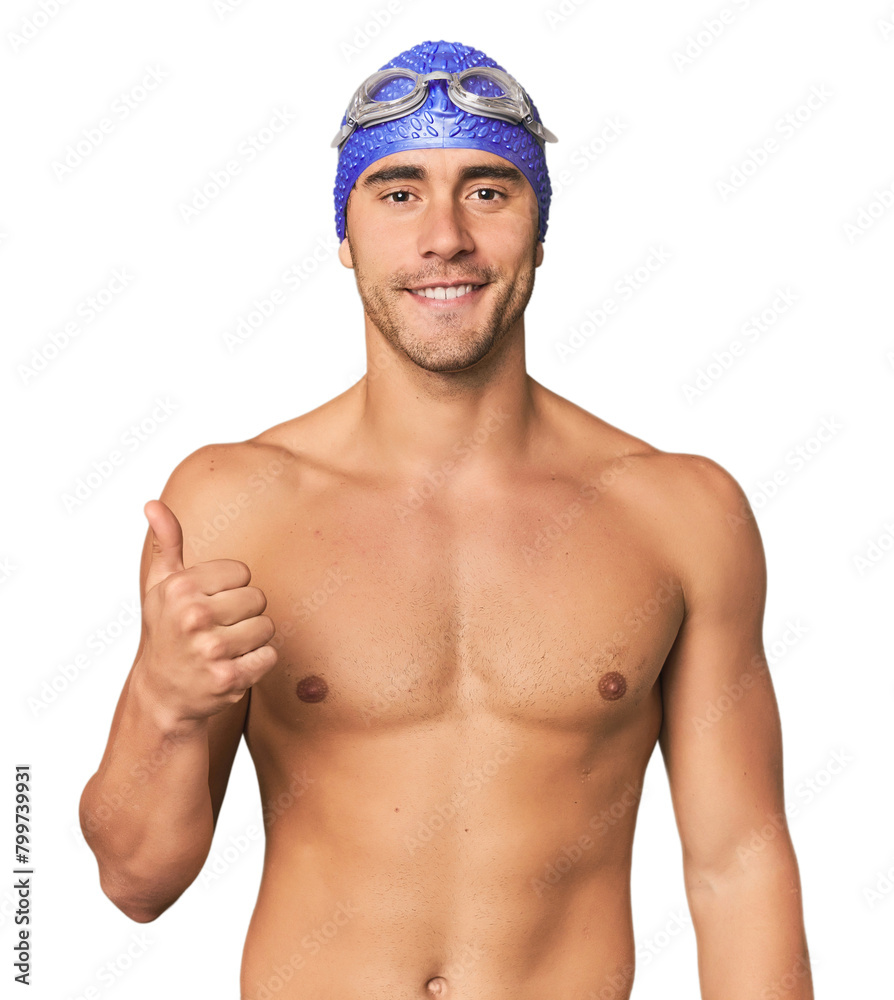 Young Hispanic man with swim gear smiling and raising thumb up