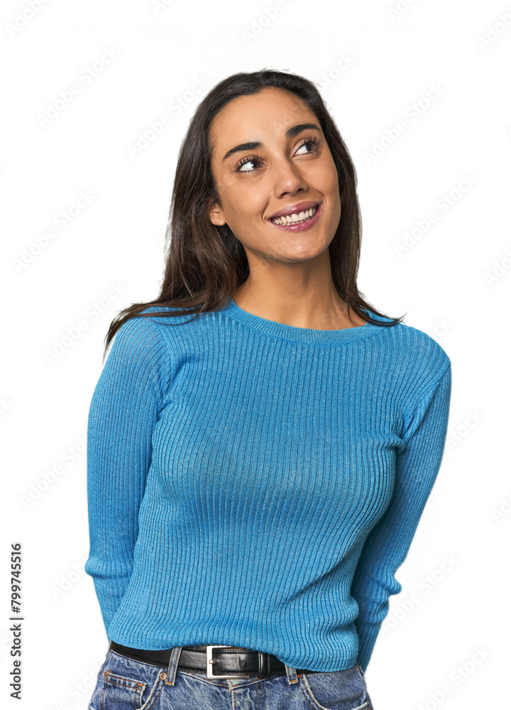 Hispanic young woman relaxed and happy laughing, neck stretched showing teeth. Hispanic young woman relaxed and happy laughing, neck stretched showing teeth.