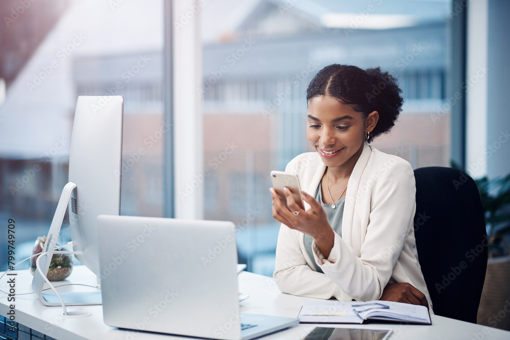 Business woman, office and smile from phone text with a content creator with social media break. Desk, creative agency and African professional with internet, app and happy from online message Business woman, office and smile from phone text with a content creator with social media break. Desk, creative agency and African professional with internet, app and happy from online message