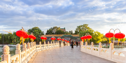 Panorama of the traditional red chinese lanterns on Yongan bridge in Beihai Park in Beijing, China
