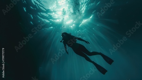 woman diving underwater