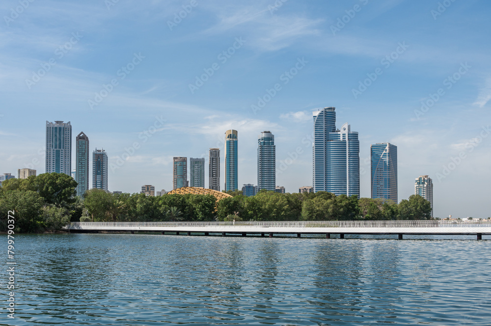 Panorama of the center of the Emirate of Sharjah, United Arab Emirates . Corniche area of Sharjah, UAE city. Panorama of the center of the Emirate of Sharjah, United Arab Emirates . Corniche area of Sharjah, UAE city.