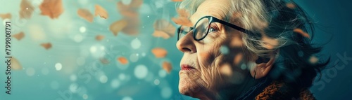 An elderly woman looking out the window, deep in thought, with a peaceful expression on her face. photo