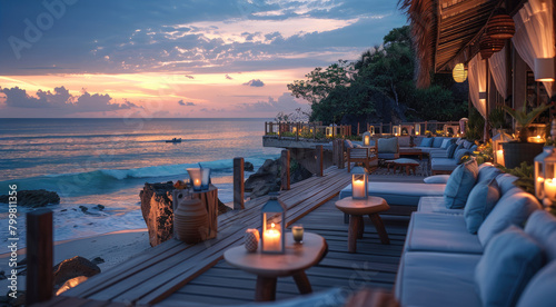 Fototapeta Naklejka Na Ścianę i Meble -  A cozy outdoor lounge area with comfortable seating, candles and soft lighting overlooking the ocean. Generative AI.