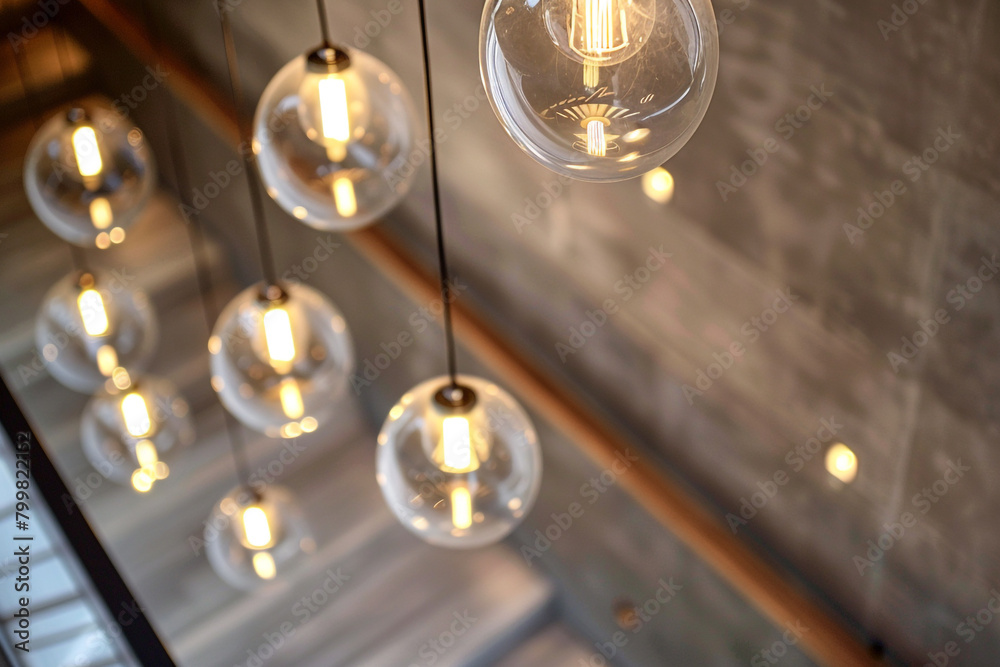 Series of Italian light fixtures across a retail space enhancing shopping experience. Series of Italian light fixtures across a retail space enhancing shopping experience.