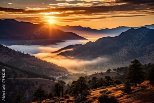 Breathtaking Sunset Over Misty Mountain Landscape