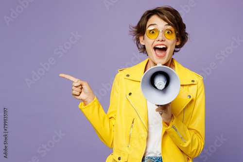 Cuadro en lienzo Young excited woman wears yellow shirt white t-shirt casual clothes glasses hold megaphone scream announces discounts sale Hurry up isolated on plain pastel light purple background