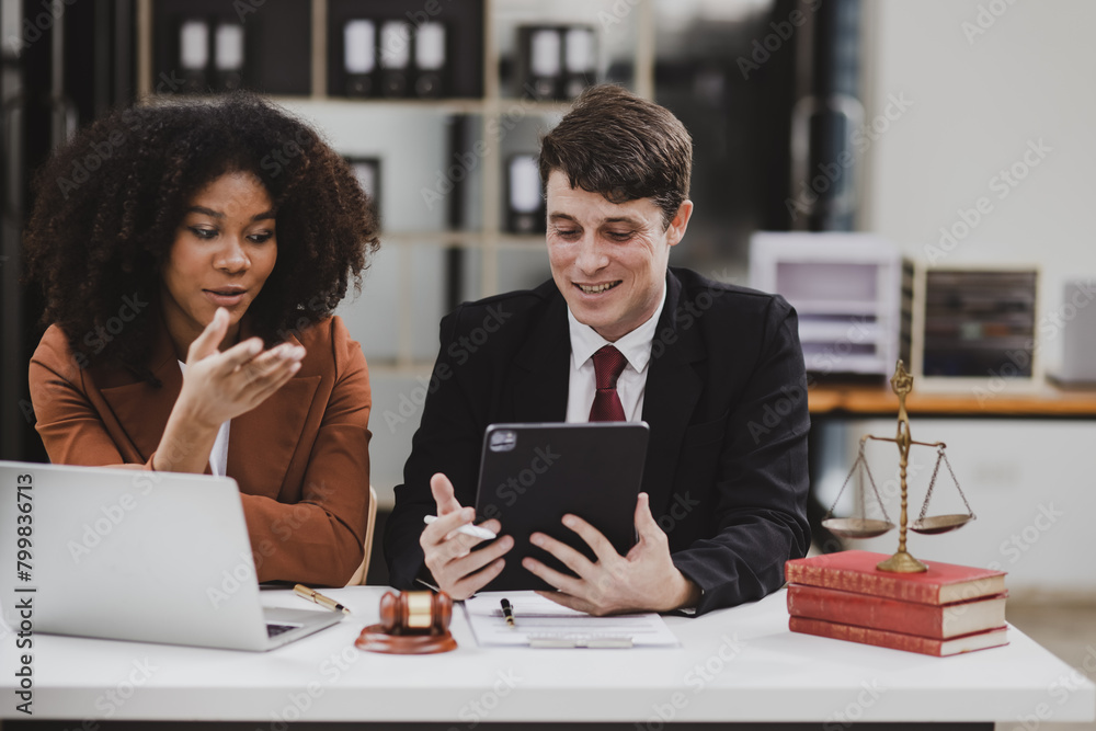 Lawyer or judge consult, Two female lawyers discussing about contract and agreement concept. Lawyer or judge consult, Two female lawyers discussing about contract and agreement concept.