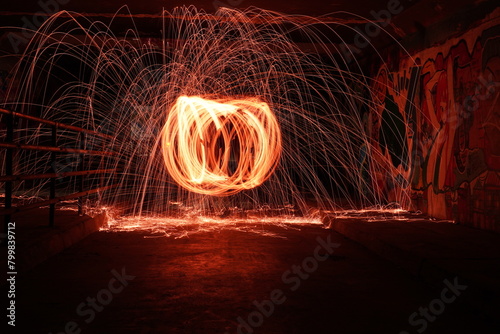 fire and flames steel wool photography in underground crossing
