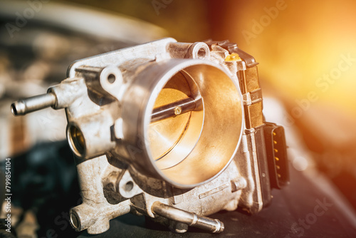 Konstfotografi The electronic throttle body and modern car underhood with opposed engine in the background