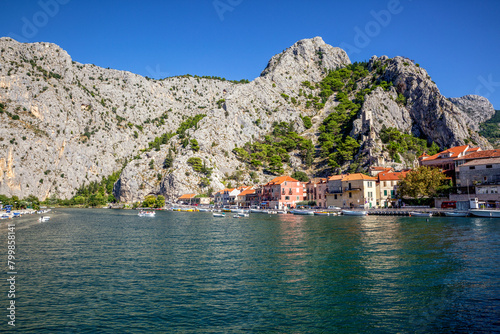 Croatia,Split-DalmatiaCounty, Omis, Bay of coastal town situated at confluence of Adriatic Sea andCetinariver photo