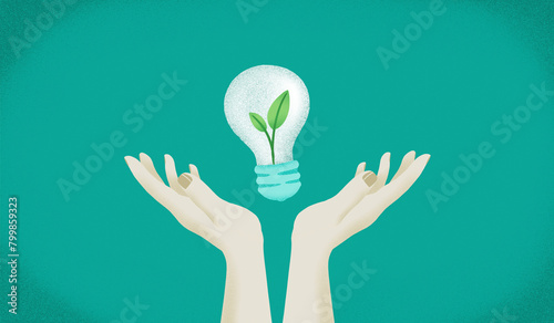 Hands with leaf in light bulb against green background photo